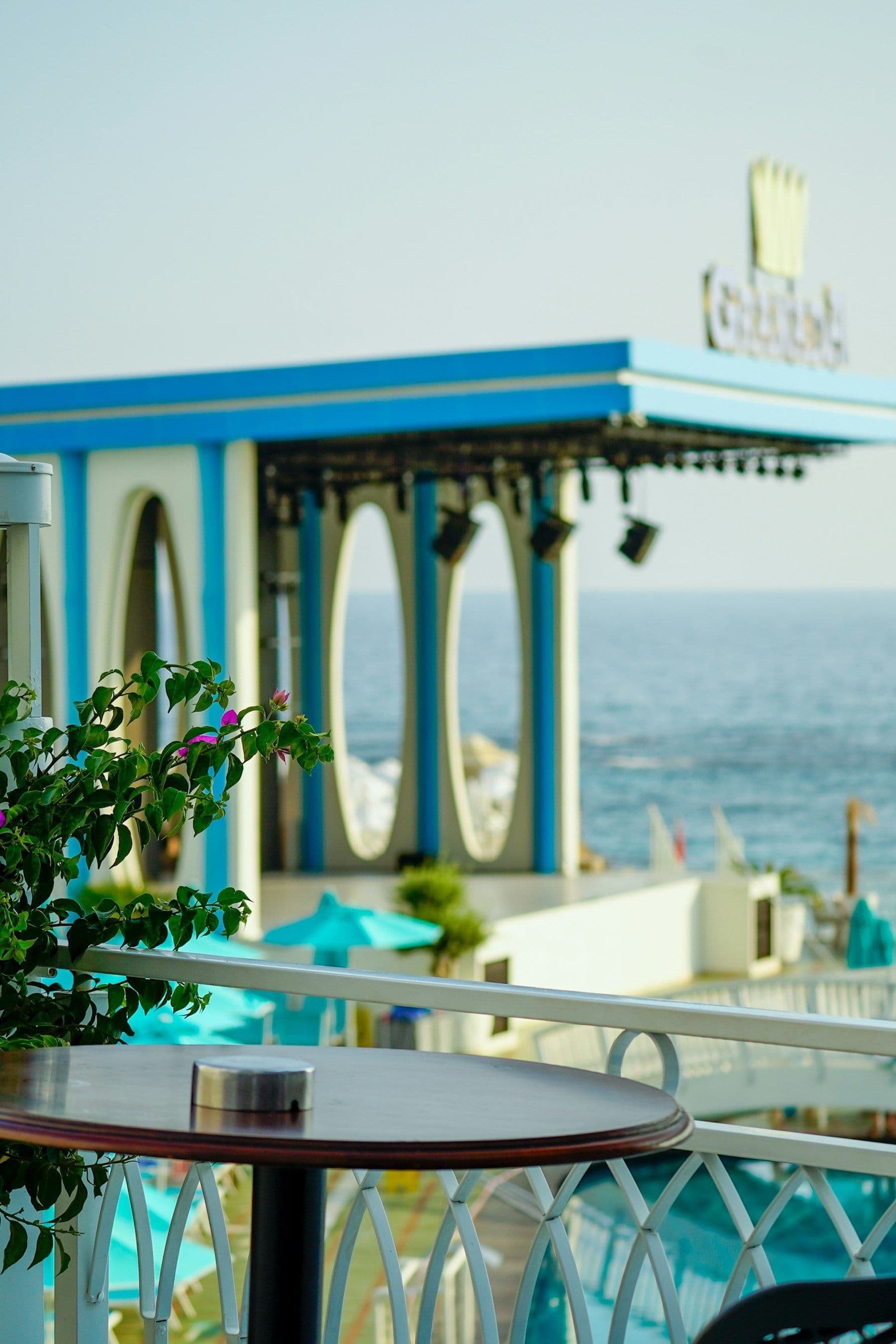 Illustrative image: balcony table overlooking the coast