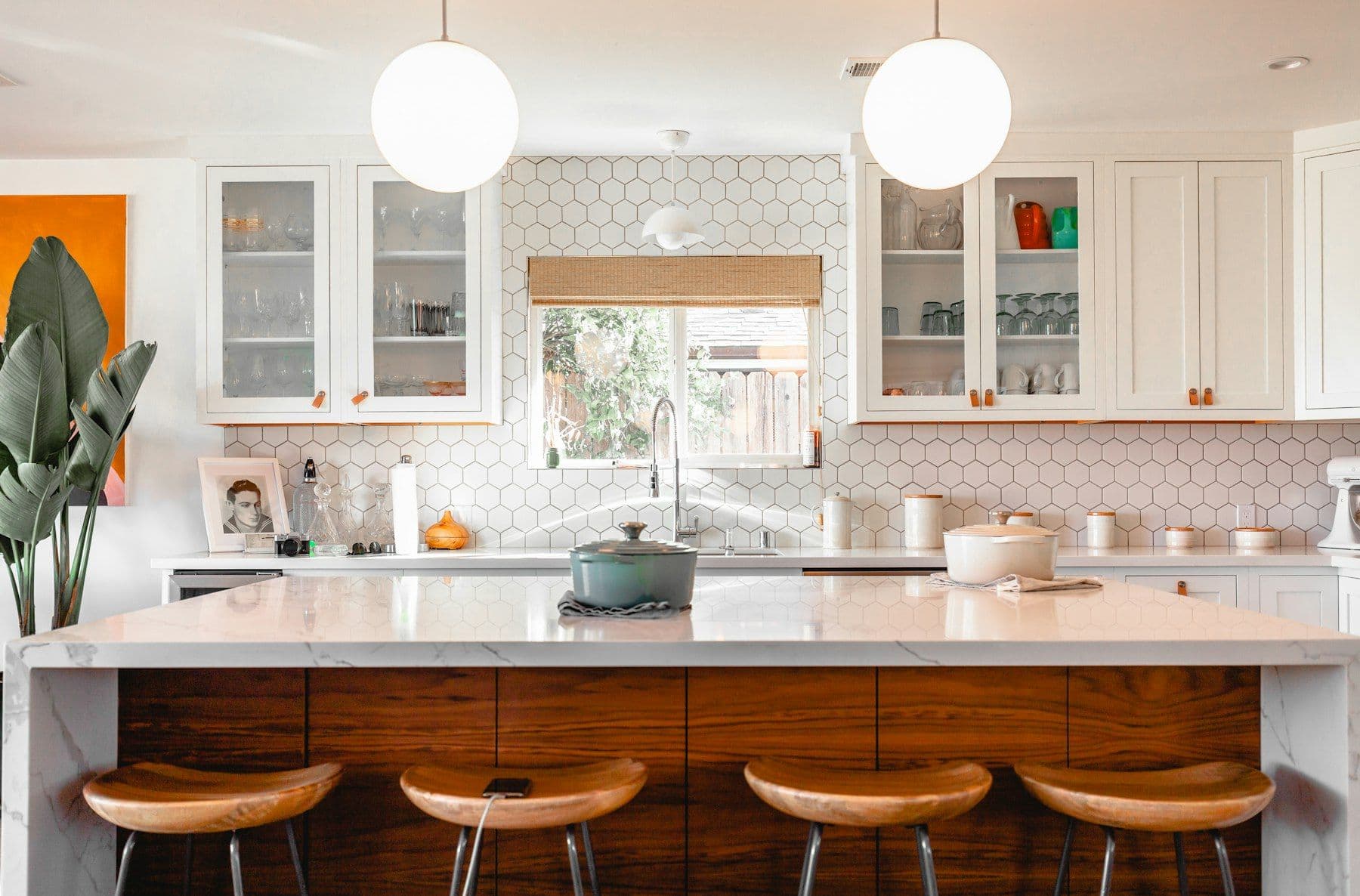 Illustrative image: kitchen island with four stools